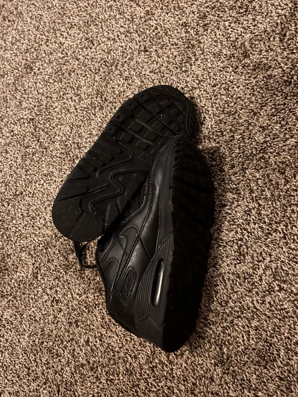 Nike Kids Black Low-Top Sneaker with Subtle Swoosh
